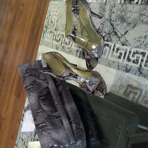 8 1/2M Snake Print 3" heels  with matching purse.